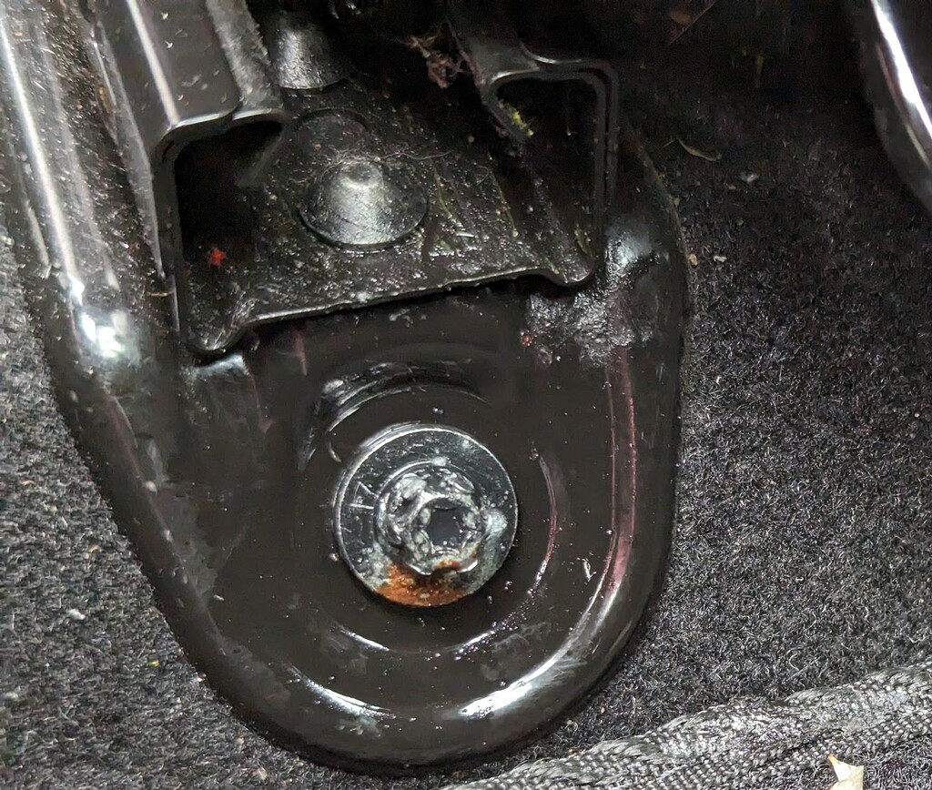 remove-rounded-worn-out-star-shaped-car-seat-bolt-body-interior