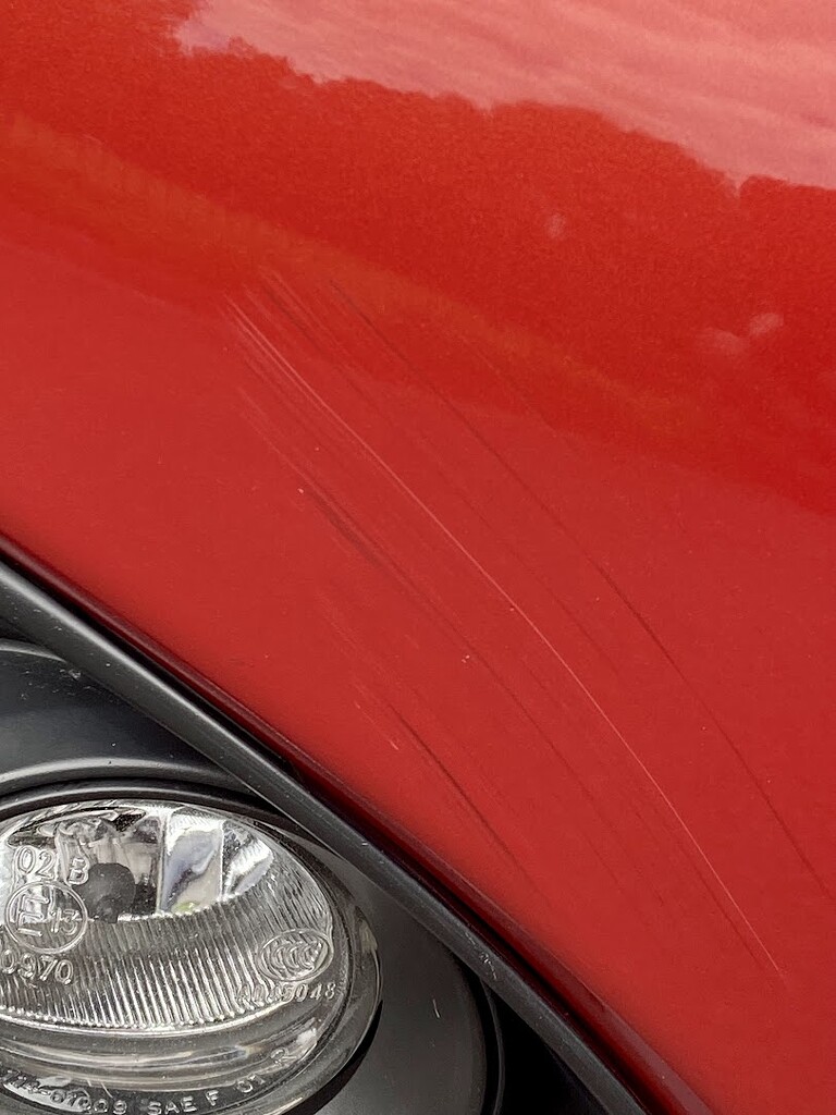 Guidance on removing "paint transfer" from car park knock? Cleaning