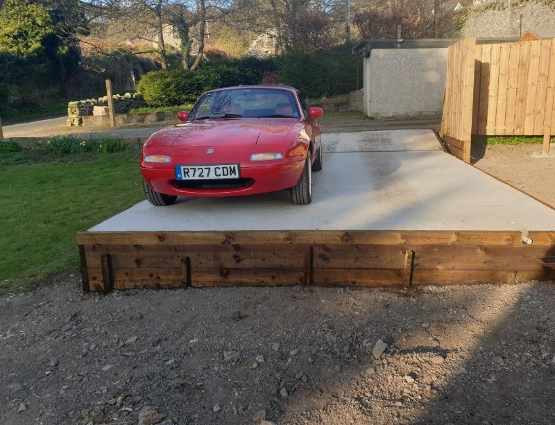 Mindy on garage base - pass side front 2.jpg